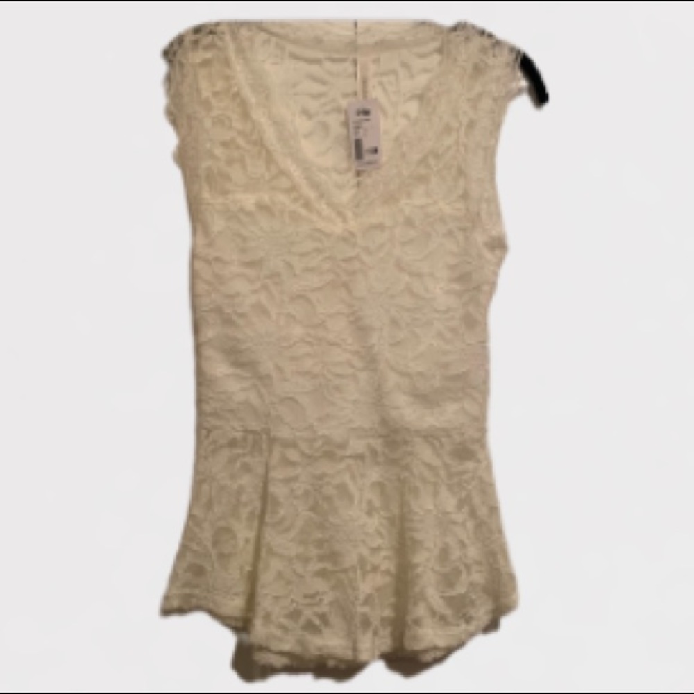 Pretty soft lace peplum blouse